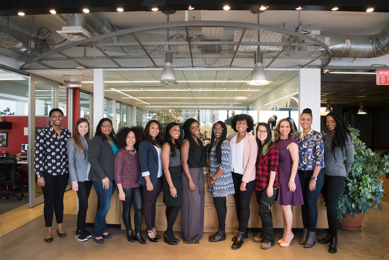 Services Group Of Women Standing Near Desk 1181438